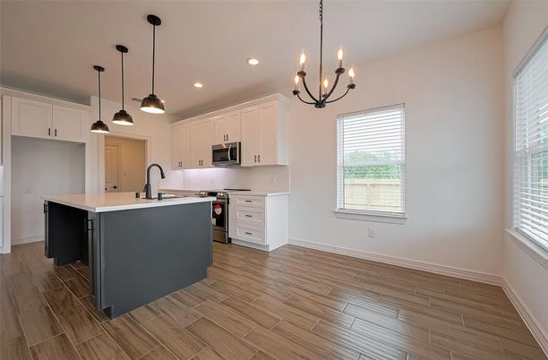 Chandelier, Interior, Kitchen, Pendant Lights, Recessed Lighting, Stainless Steel Appliances, Wood Texture Flooring
