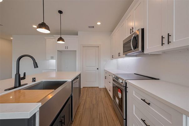 Interior, Kitchen, Pendant Lights, Recessed Lighting, Stainless Steel Appliances, Wood Texture Flooring