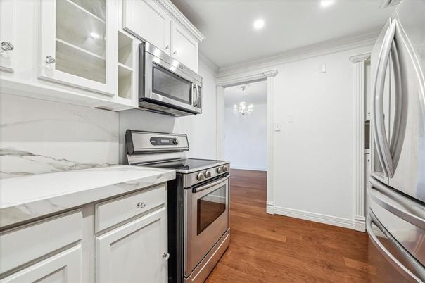 Chandelier, Interior, Kitchen, Recessed Lighting, Stainless Steel Appliances, Wood Texture Flooring