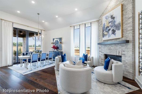 Dining room, Fireplace, Interior, Living room, Pendant Lights, Recessed Lighting, Wood Texture Flooring