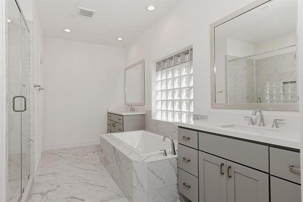 Bathroom, Dual Sink Vanities, Glass Shower, Interior, Marble, Marble Walls, Recessed Lighting