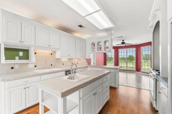 Interior, Kitchen, Tile Countertops, Wood Texture Flooring