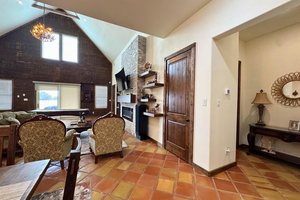 Chandelier, Dining room, Fireplace, Interior, Stone Walls