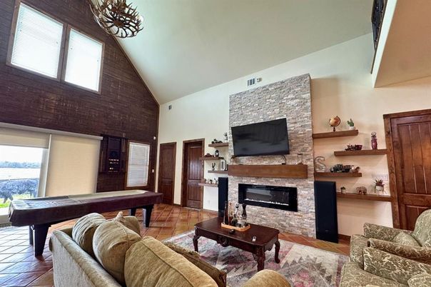 Billiard Table, Fireplace, Game Room, Interior, Living room, Stone Walls, Wood Texture Flooring, Wooden Walls