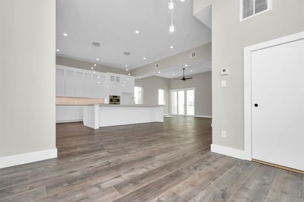 Empty room, Interior, Kitchen, Pendant Lights, Recessed Lighting, Wood Texture Flooring
