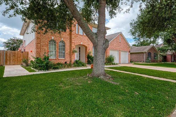 Attached, Backyard, Exterior, Facade, Brick Facade, Tudor Revival