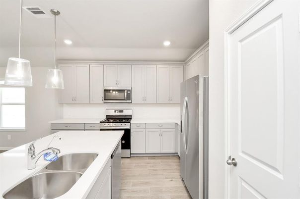 Interior, Kitchen, Pendant Lights, Recessed Lighting, Stainless Steel Appliances, Wood Texture Flooring