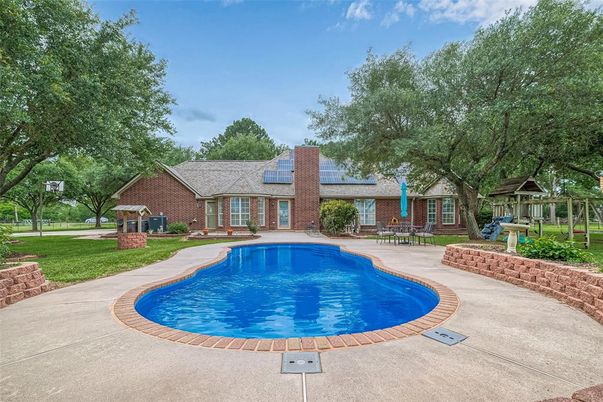 Exterior, Pool, Solar Panels