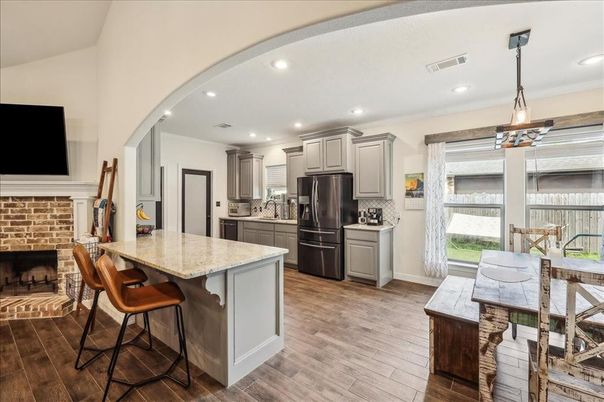 Dining room, Interior, Kitchen, Pendant Lights, Recessed Lighting, Stainless Steel Appliances, Wood Texture Flooring