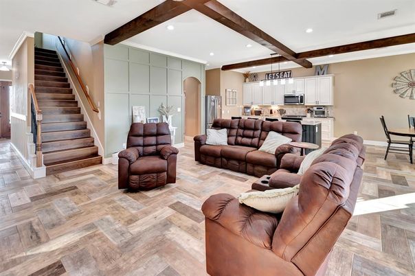 Dining room, Interior, Kitchen, Living room, Pendant Lights, Recessed Lighting, Stainless Steel Appliances, Wooden Beams, Wood Texture Flooring