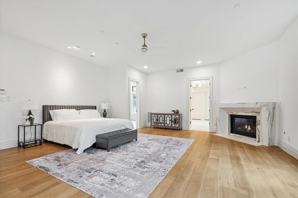 Bedroom, Fireplace, Interior, Recessed Lighting, Wood Texture Flooring