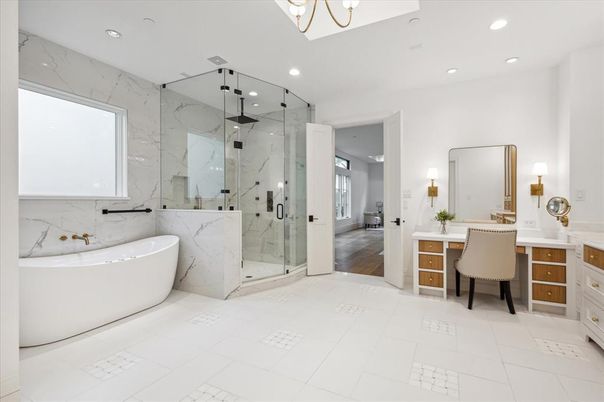 Bathroom, Dual Sink Vanities, Free Standing Baths, Glass Shower, Interior, Marble Walls, Recessed Lighting