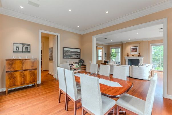 Dining room, Fireplace, Interior, Living room, Recessed Lighting, Wood Texture Flooring
