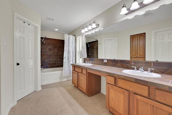 Bathroom, Dual Sink Vanities, Interior, Recessed Lighting, Tile Countertops