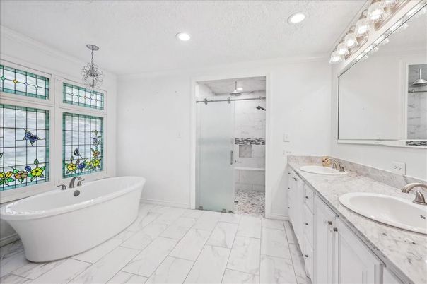 Bathroom, Dual Sink Vanities, Free Standing Baths, Glass Shower, Interior, Marble, Marble Walls, Recessed Lighting