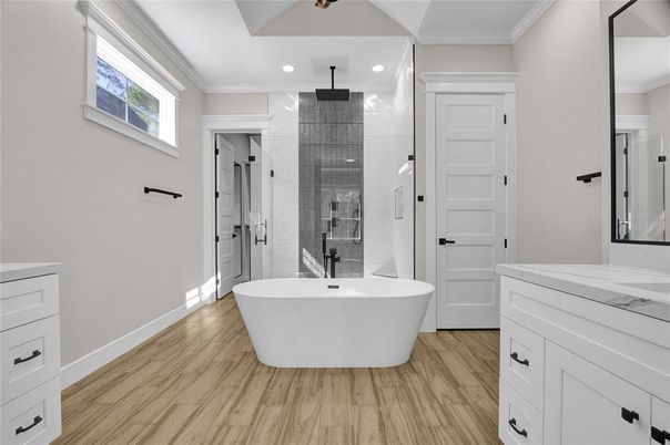 Bathroom, Free Standing Baths, Glass Shower, Interior, Recessed Lighting, Wood Texture Flooring