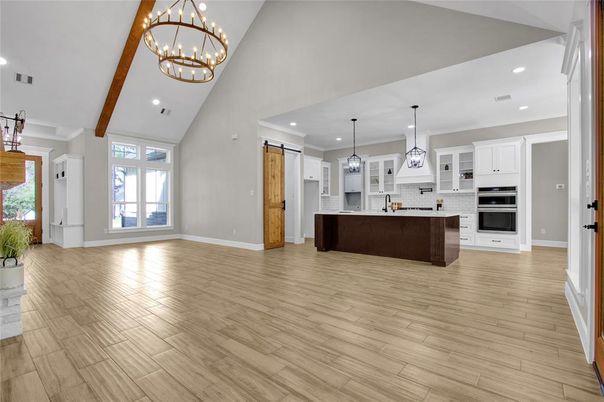 Chandelier, Interior, Kitchen, Pendant Lights, Recessed Lighting, Stainless Steel Appliances, Wood Texture Flooring