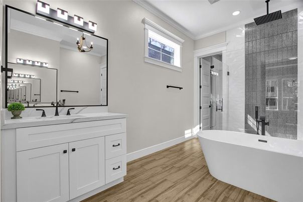 Bathroom, Dual Sink Vanities, Free Standing Baths, Glass Shower, Interior, Recessed Lighting, Wood Texture Flooring