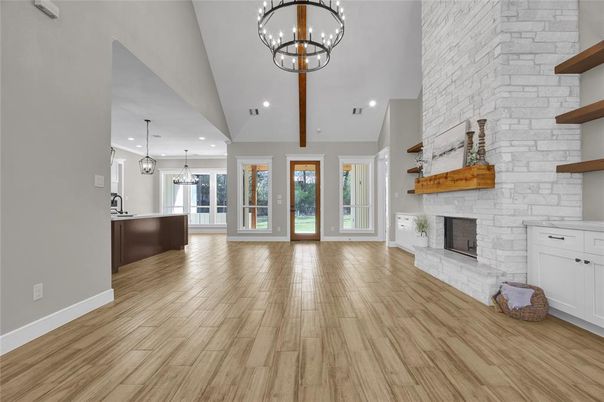 Fireplace, Interior, Pendant Lights, Recessed Lighting, Stone Walls, Wood Texture Flooring