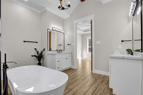 Bathroom, Dual Sink Vanities, Free Standing Baths, Interior, Recessed Lighting, Wood Texture Flooring