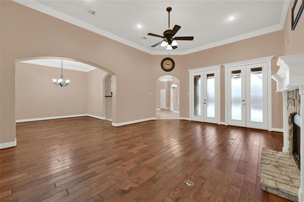 Chandelier, Empty room, Fireplace, Interior, Recessed Lighting, Wood Texture Flooring
