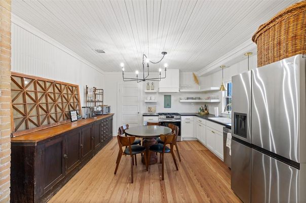 Chandelier, Dining room, Interior, Kitchen, Pendant Lights, Stainless Steel Appliances, Wood Texture Flooring