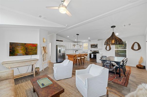 Dining room, Interior, Kitchen, Living room, Pendant Lights, Recessed Lighting, Stainless Steel Appliances, Wood Texture Flooring