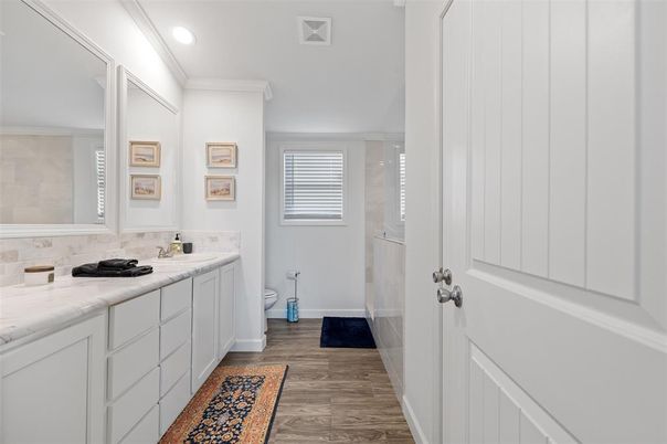 Bathroom, Dual Sink Vanities, Interior, Recessed Lighting, Wood Texture Flooring