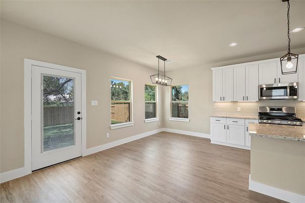 Interior, Kitchen, Pendant Lights, Recessed Lighting, Stainless Steel Appliances, Wood Texture Flooring