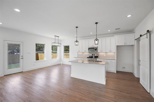 Interior, Kitchen, Pendant Lights, Recessed Lighting, Stainless Steel Appliances, Wood Texture Flooring