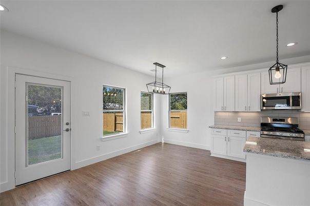 Interior, Kitchen, Pendant Lights, Recessed Lighting, Stainless Steel Appliances, Wood Texture Flooring