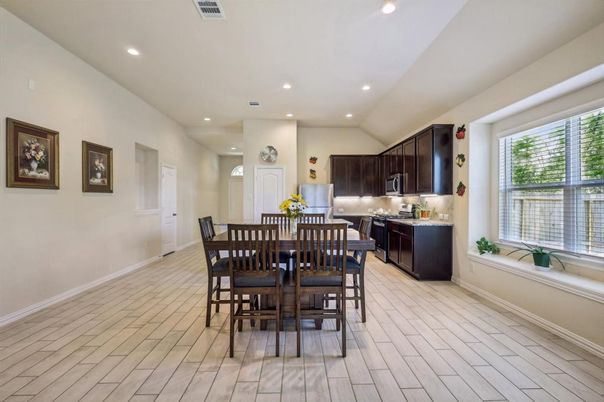 Dining room, Interior, Kitchen, Recessed Lighting, Stainless Steel Appliances, Wood Texture Flooring