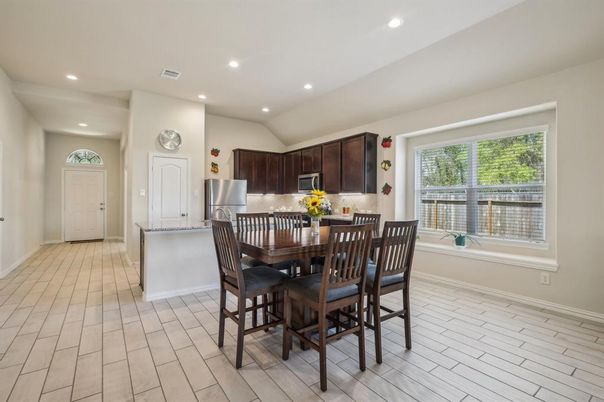 Dining room, Interior, Kitchen, Recessed Lighting, Stainless Steel Appliances, Wood Texture Flooring