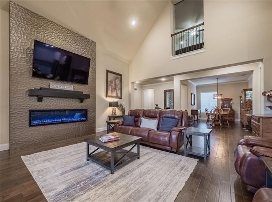 Dining room, Fireplace, Interior, Living room, Pendant Lights, Recessed Lighting, Wood Texture Flooring