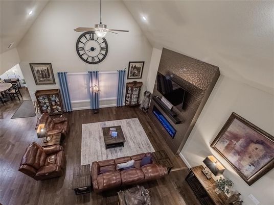 Dining room, Fireplace, Interior, Living room, Recessed Lighting, Wood Texture Flooring