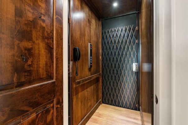 Elevator, Interior, Recessed Lighting, Wood Texture Flooring, Wooden Walls