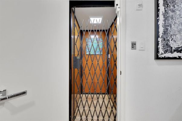 Elevator, Interior, Recessed Lighting, Wooden Walls