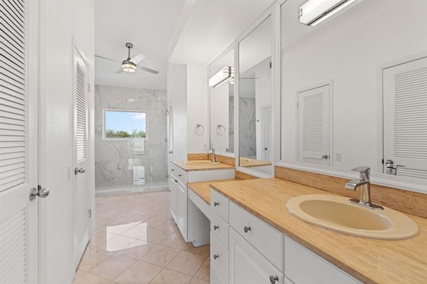 Bathroom, Dual Sink Vanities, Glass Shower, Interior, Marble Walls