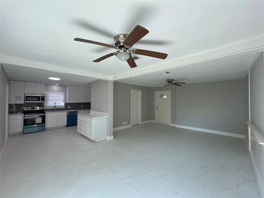 Empty room, Interior, Kitchen, Marble, Recessed Lighting, Stainless Steel Appliances