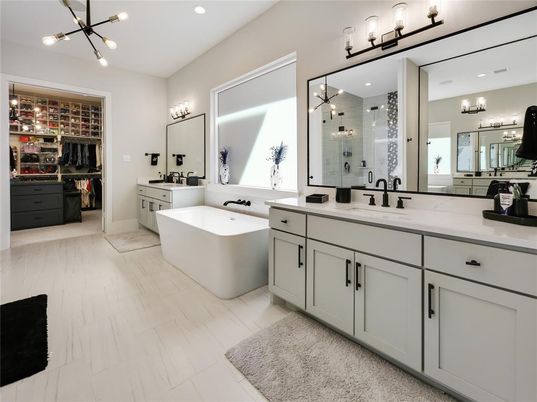 Bathroom, Dual Sink Vanities, Free Standing Baths, Interior, Marble, Pendant Lights, Recessed Lighting