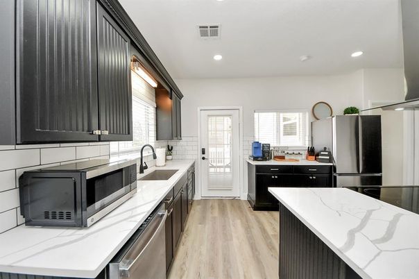 Interior, Kitchen, Recessed Lighting, Stainless Steel Appliances, Wood Texture Flooring