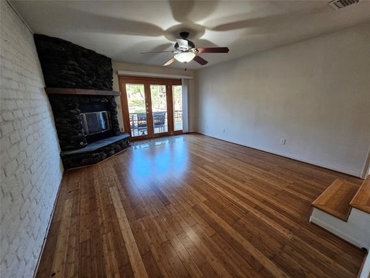 Empty room, Fireplace, Interior, Stone Walls, Wood Texture Flooring