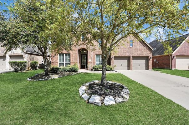 Attached, Backyard, Exterior, Facade, Brick Facade, Brick Traditional