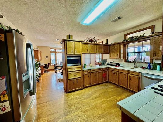 Dining room, Interior, Kitchen, Tile Countertops, Wood Texture Flooring