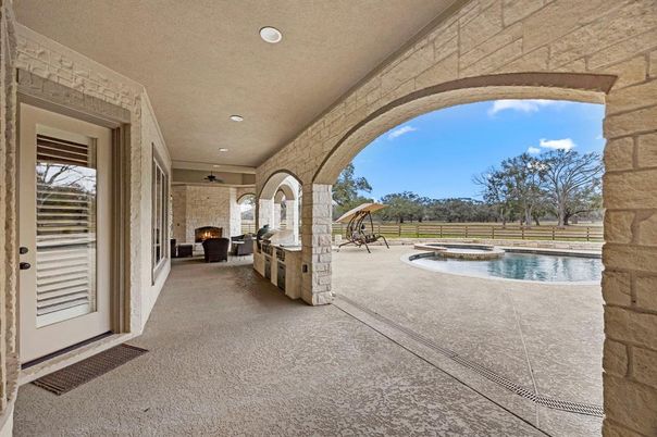Exterior, Fireplace, Pool
