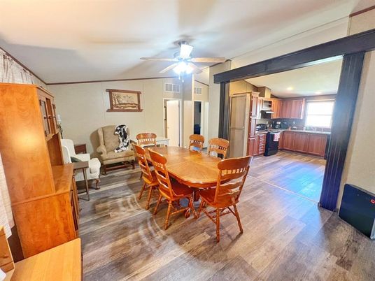 Dining room, Interior, Kitchen, Living room, Recessed Lighting, Stainless Steel Appliances, Wood Texture Flooring