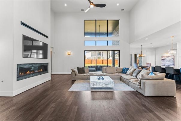 Dining room, Fireplace, Interior, Living room, Pendant Lights, Recessed Lighting, Wood Texture Flooring