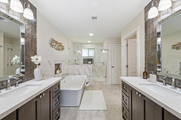 Bathroom, Dual Sink Vanities, Free Standing Baths, Glass Shower, Interior, Marble, Marble Walls, Recessed Lighting
