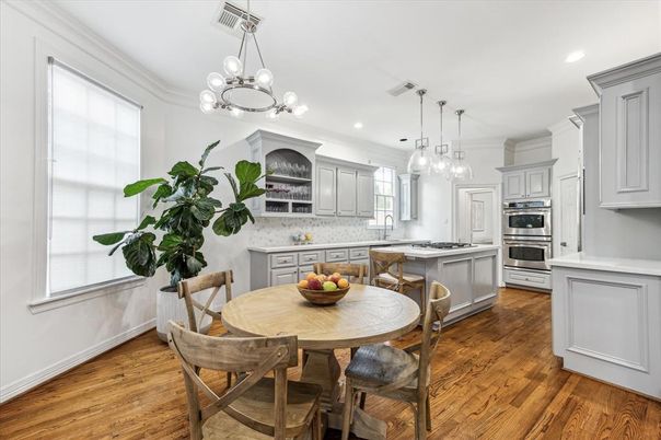 Dining room, Interior, Kitchen, Pendant Lights, Recessed Lighting, Stainless Steel Appliances, Wood Texture Flooring