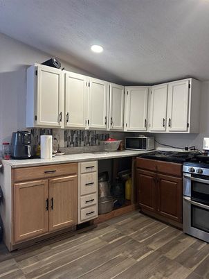 Interior, Kitchen, Recessed Lighting, Stainless Steel Appliances, Wood Texture Flooring
